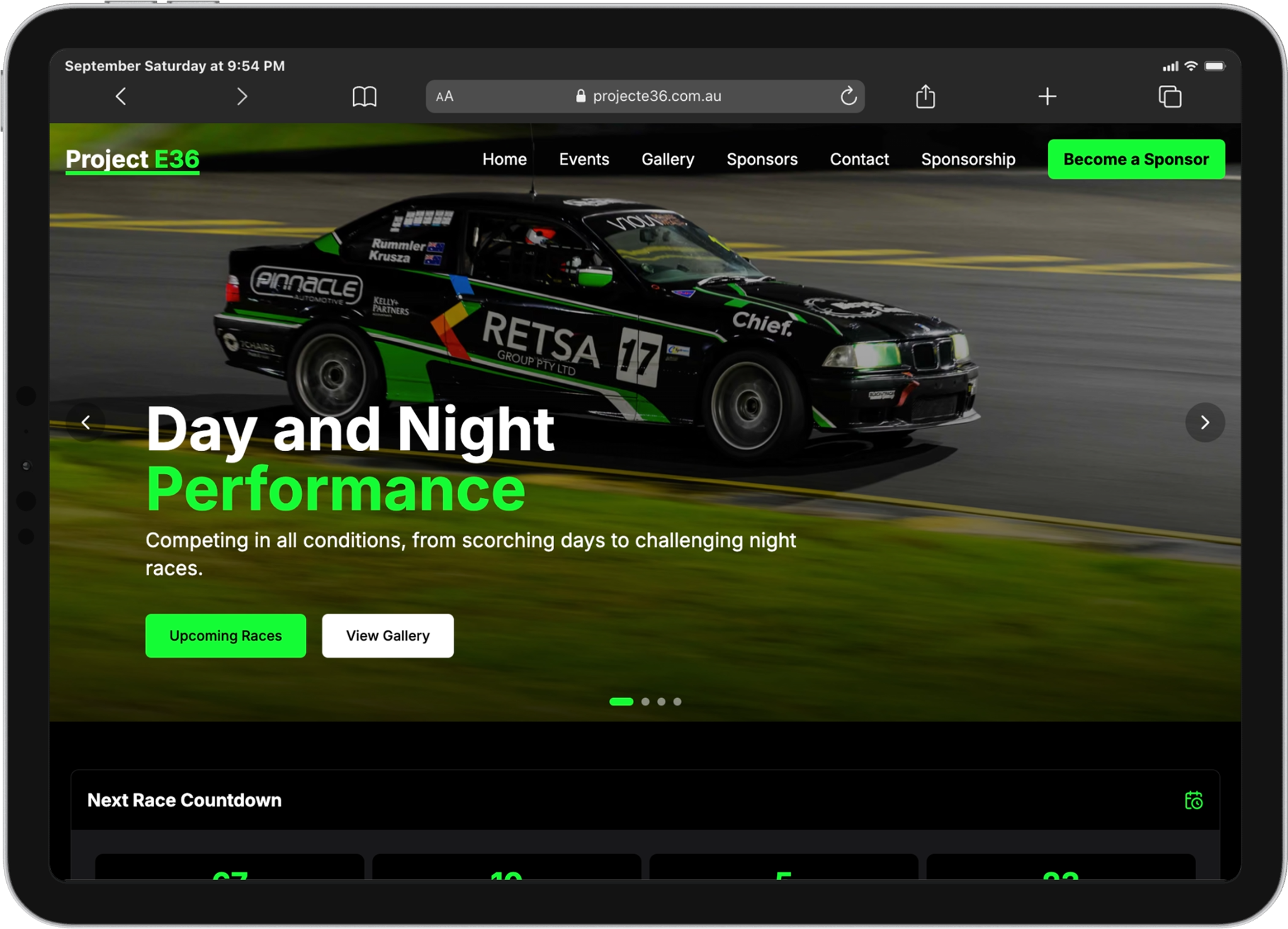 Project E36 Race Team website displayed on a landscape iPad, featuring the RETSA-sponsored BMW race car and links to upcoming races and the gallery